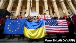 Georgians protest against a draft law on "foreign agents," in March 2023. Although the controversial bill was shelved last year, the Tbilisi government now plans to reintroduce similar legislation. 