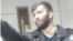 تصویری از سروان بهنام زارعی که از تحمیل حجاب اجباری خودداری کرد