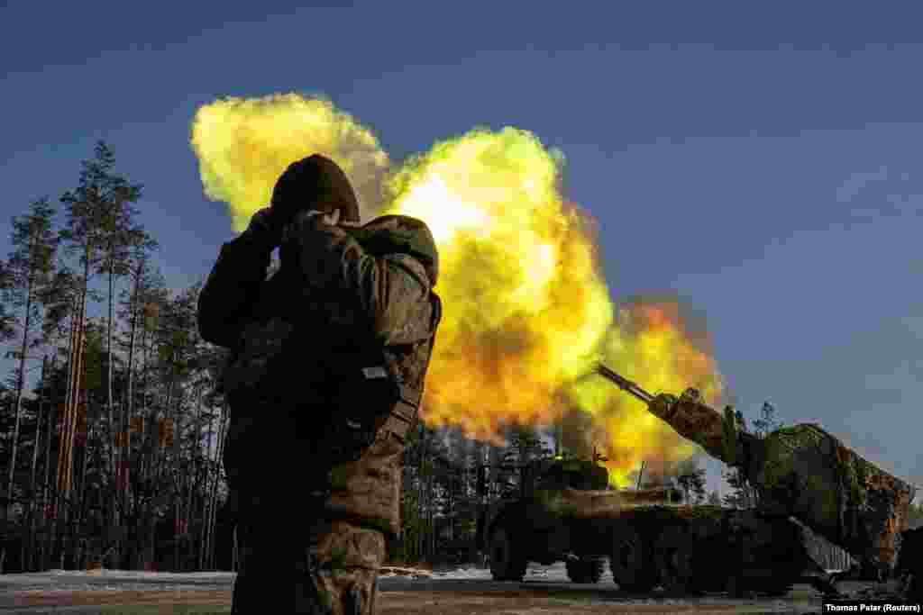 Ukrainian soldiers fire a Swedish-made Archer self-propelled howitzer at Russian positions in the Donetsk region of eastern Ukraine on December 16. Kyiv&#39;s forces are facing a shortage of artillery shells and have scaled back some military operations because of a shortfall in foreign assistance, a senior army general told Reuters.