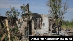 Последствия обстрелов в Донецкой области Украины