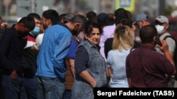 Migrant workers outside the Unified Migration Center of the Moscow Region in Putilkovo in May 2021.