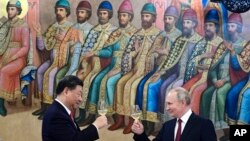 Președintele Chinei, Xi Jinping, și cel al Rusiei, Vladimir Putin pe 21 martie 2023, în timpul vizitei de stat de trei zile a lui Xi Jinping la Moscova.