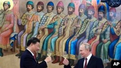 Președintele Chinei Xi Jinping și președintele Rusiei Vladimir Putin la dineul de stat găzduit de Președintele Rusiei, Moscova, Rusia, 21 martie 2023.