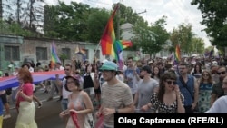 Hundreds of people strolled the streets waving rainbow flags and banners promoting tolerance.