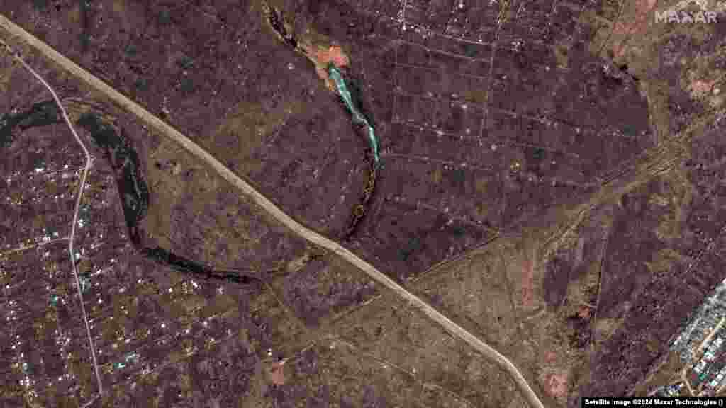 A before-and-after view of an embankment collapse over the Ural River tributary Russia continues to struggle to contain the flooding, which resulted from swiftly melting snow and a dam breach in the city of Orsk.