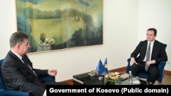 Kosovar Prime Minister Albin Kurti (right) meets with with EU envoy Miroslav Lajcak in Pristina on July 4.