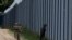 Polish soldiers patrol along the border fence on the Polish-Belarusian border in Usnarz Gorny.