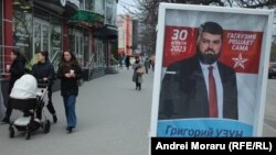 Afiș electoral la Comrat cu imaginea candidatului susținut de PSRM, Grigore Uzun, 31 martie 2023
