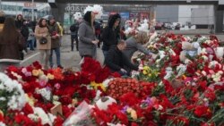 People mourn and bring flowers to the Crocus City Hall concert venue following a terrorist attack in Krasnogorsk, outside Moscow, on March 25.