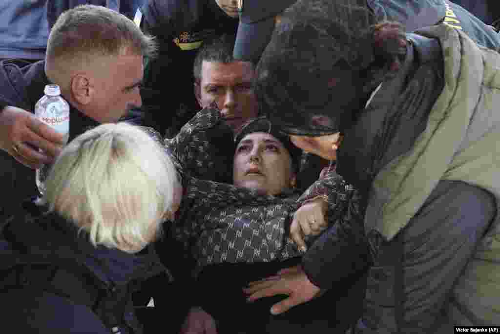  Natalya reacts during her husband&#39;s funeral in Bilhorod-Dnistrovskiy, Ukraine. Vitaliy Alimov, a firefighter, was killed in the Russian attack on Odesa on March 15.&nbsp; 