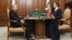 Russian President Vladimir Putin (left) meets with Anna Tsivilyova at the Kremlin in April. 