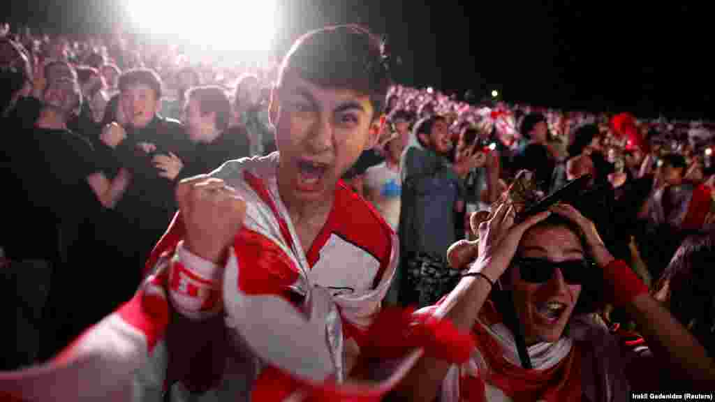 Fans react to Georgia&#39;s historic win over Portugal in the Mikheil Meskhi Stadium in Tbilisi on June 26.&nbsp; The win represents Georgia&#39;s biggest accomplishment in the Euro tournament since the country gained independence from the Soviet Union in 1991.