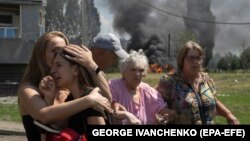 Bloody Aftermath Of Russian Missile Strike On Residential Neighborhood In Ukraine's Kharkiv Region