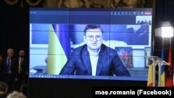 Ukrainian Foreign Minister Dmytro Kuleba addresses a Black Sea security conference in Bucharest via a video link on April 13. 