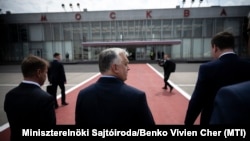 Hungarian Prime Minister Viktor Orban (center) arrives in Moscow on July 5.