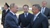 Vlagyimir Putyin orosz államfő a tatár elnökkel, Rusztam Nurgalijevics Minnyihanovval 2012. augusztus 9-én