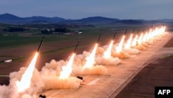 Испытательные стрельбы из 600-миллиметровой сверхбольшой реактивной артиллерии в КНДР. 30 мая 2024 года