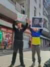 Russian opposition activists at 'Noon Against Putin' near Russian Embassy in Podgorica, Montenegro