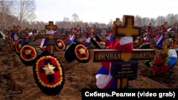 Массовое захоронение наемников ЧВК "Вагнер" на Гусинобродском кладбище в Новосибирске, Россия