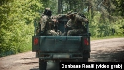 Бійці Другого інтернаціонального легіону оборони України їдуть на бойове завдання