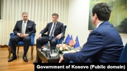 U.S. envoy Gabriel Escobar (left) and EU envoy Miroslav Lajcak meet with Kosovo's Albin Kurti (right) on June 5. 