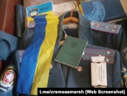 Украинская символика, якобы выявленная российскими силовиками в доме Николая Мазанки в Симферополе. Крым, 11 апреля 2024 года