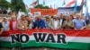 Supporters of Hungarian Prime Minister Viktor Orban march in Budapest on June 1. 