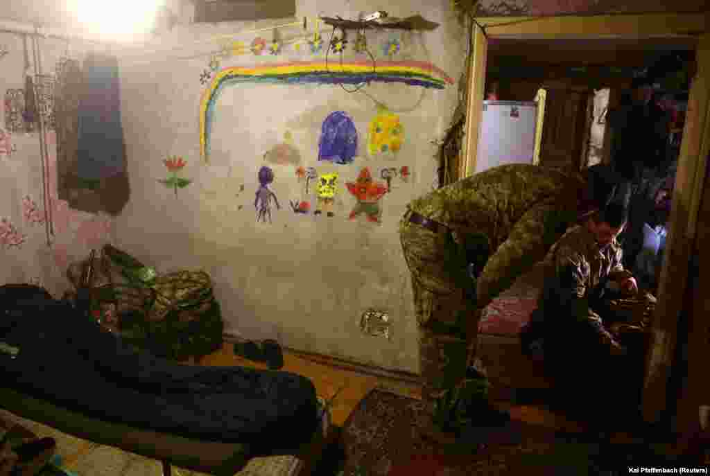 Ukrainian soldiers rest inside their hideout on April 14. Though taking control of the Bakhmut &quot;meat grinder,&quot; where thousands of soldiers are estimated to have been killed on both sides, would be a largely symbolic victory for Moscow, it would allow its forces to focus on Ukrainian garrisons around Chasiv Yar and deeper in the Donetsk region, where Kramatorsk and Slovyansk await.