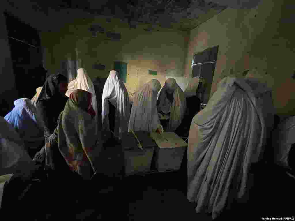 Women vote during parliamentary elections in Khyber Pakhtunkhwa Province in Pakistan on February 8.