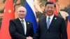 Russian President Vladimir Putin (left) and Chinese President Xi Jinping. (file photo)