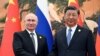 Presidenti rus Vladimir Putin (majtas) dhe presidenti kinez Xi Jinping. (Fotografi nga arkivi)
