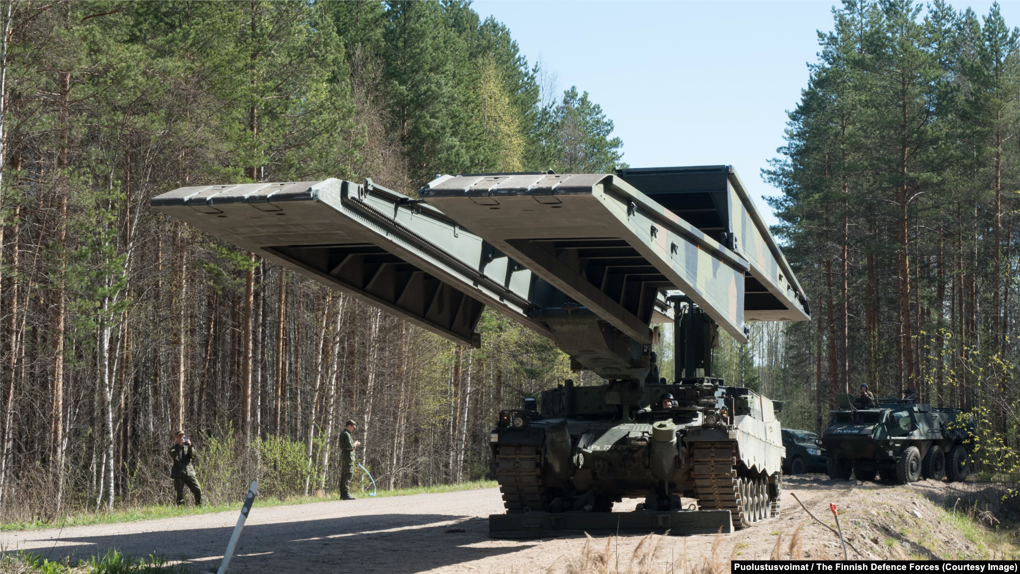 Leopard 2L Armored Bridge Layer This German-made engineering vehicle is capable of extending a bridge across waterways up to 25 meters wide. Night-vision equipment allows its crew of two to lay a crossing within a few minutes, even in total darkness.  