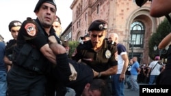 Armenian police detain a protester on Yerevan's Republic Square on August 8.