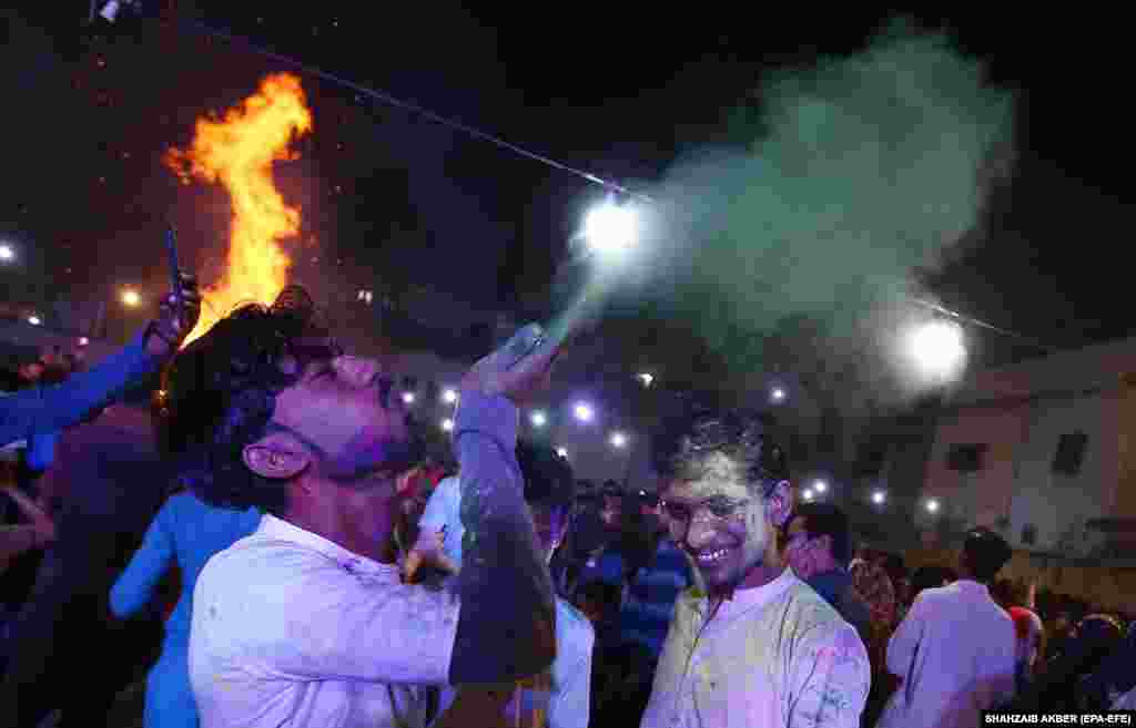 Members of the Pakistani Hindu community celebrate the Holi festival in Karachi.&nbsp;