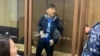 Marat Zhylanbaev appears in court in Astana on October 30.