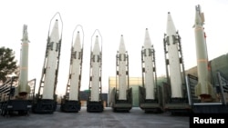 Iranian ballistic missiles are displayed during a ceremony in Tehran in 2023