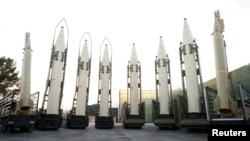 Iranian ballistic missiles are displayed during a ceremony in Tehran in August 2023.