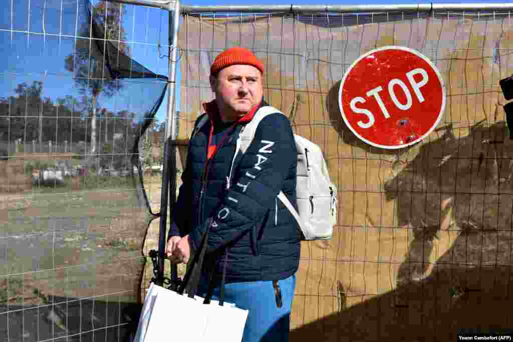 This image shows an unidentified Russian diplomat leaving a plot of vacant land in the Australian capital, Canberra, on June 26.&nbsp;