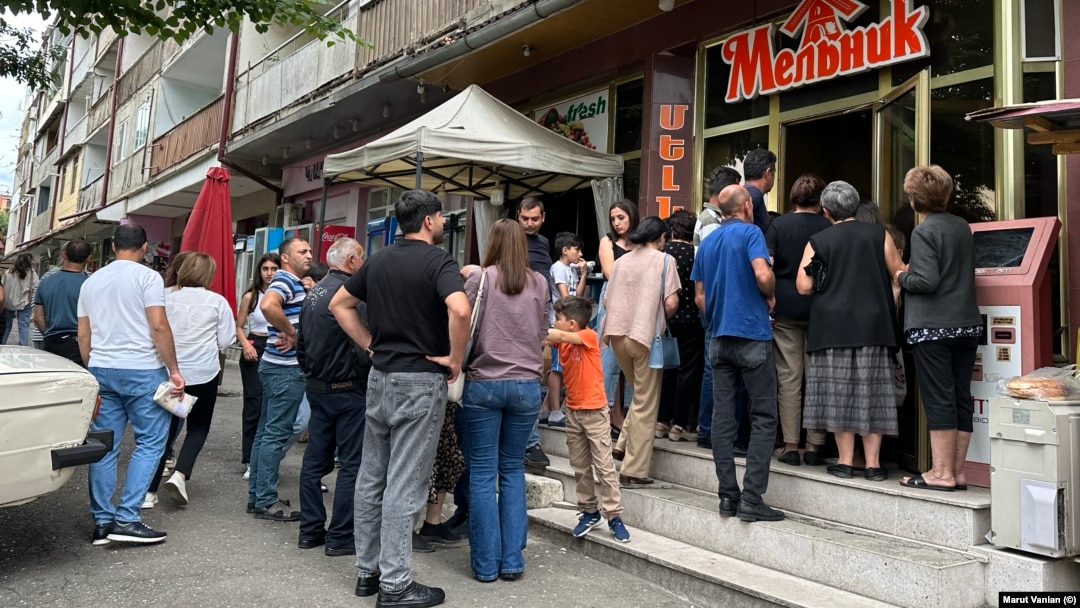 Nagorno-Karabakh - Residents of Stepanakert line up outside a food store to buy bread, July 18, 2023.