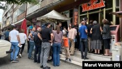 Nagorno-Karabakh - Residents of Stepanakert line up outside a food store to buy bread, July 18, 2023.