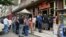 Nagorno-Karabakh - People line up outside a bakery in Stepanakert, July 18, 2023.