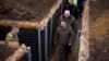 Ukraine's President Volodymyr Zelenskiy inspects new fortifications, March 27, 2024