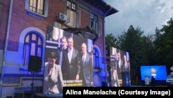 PNL, 9 iunie, alegeri locale și europarlamentare, pe ecrane rulează clipuri electorale cu președintele Klaus Iohannis și liderul liberal, Nicolae Ciucă