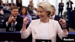 Ursula von der Leyen reacts after the announcement of her reelection by the European Parliament as president of the European Commission in a 401-284 vote with 15 abstentions on July 18.