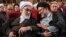 سید مهدی خاموشی (راست)، رئیس سازمان اوقاف، در کنار محمدمهدی گلپایگانی، رئیس دفتر رهبر جمهوری اسلامی، در یک مراسم رسمی، ۱۳۹۷