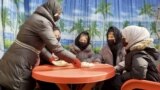 Women in a restaurant in Afghanistan