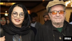 Iranian director Dariush Mehrjui (right) and his wife, Vahideh Mohammadifar (file photo)