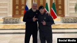 Adam Kadyrov wears his Hero of Chechnya medal alongside State Duma Deputy Adam Delimkhanov