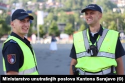 Sarajevo police officers from the traffic unit wear Hytera body cams at a press event for the launch of the pilot program on July 1.