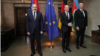 Armenia's Nikol Pashinian (left to right), German Chancellor Olaf Scholz, and Azerbaijani President Ilham Aliyev meet in Munich on February 17.